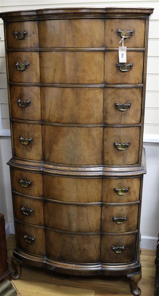 A Queen Anne style walnut shape-fronted chest on chest fitted seven drawers, H.154cm